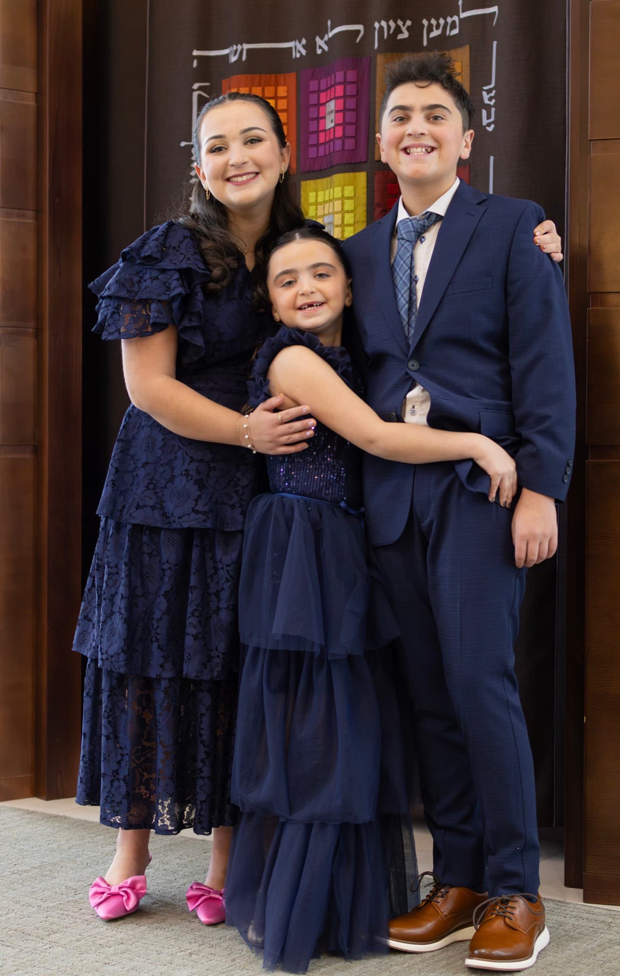 Three siblings portrait at the synagogue — Bar Mitzvah sibling photography