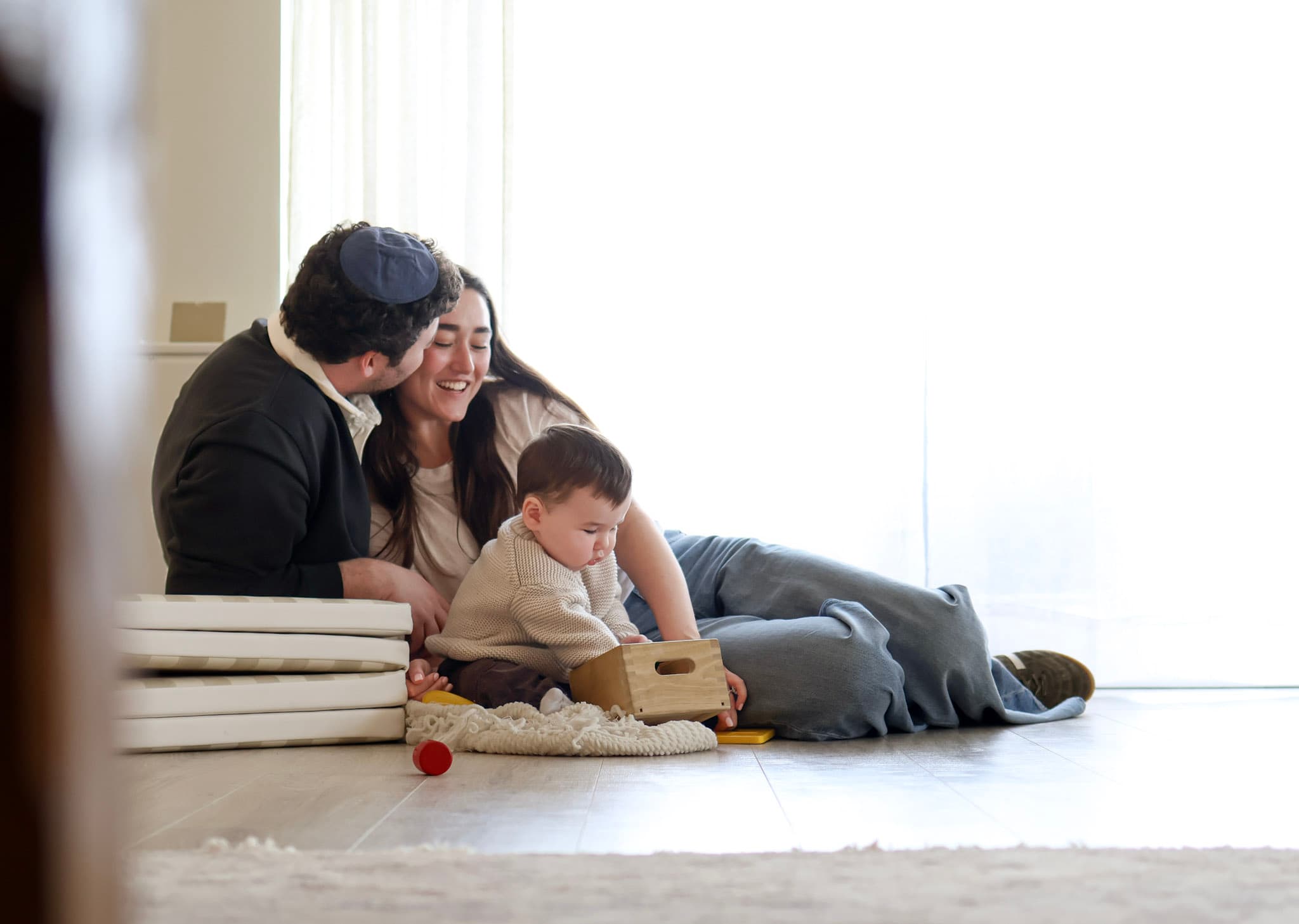 9 month baby milestone portrait in a warm neutral home setting in West Rogers Park