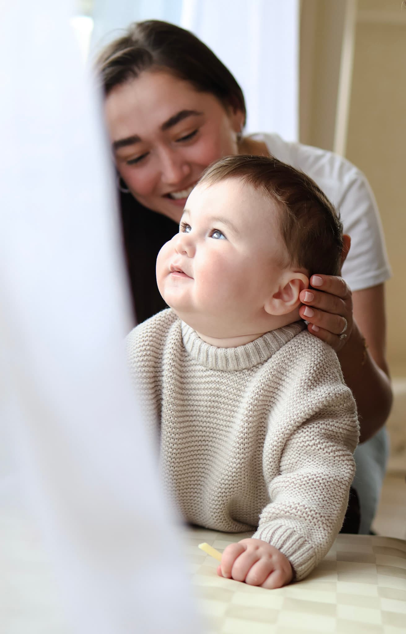 Natural light baby portrait from an in-home family session in West Rogers Park